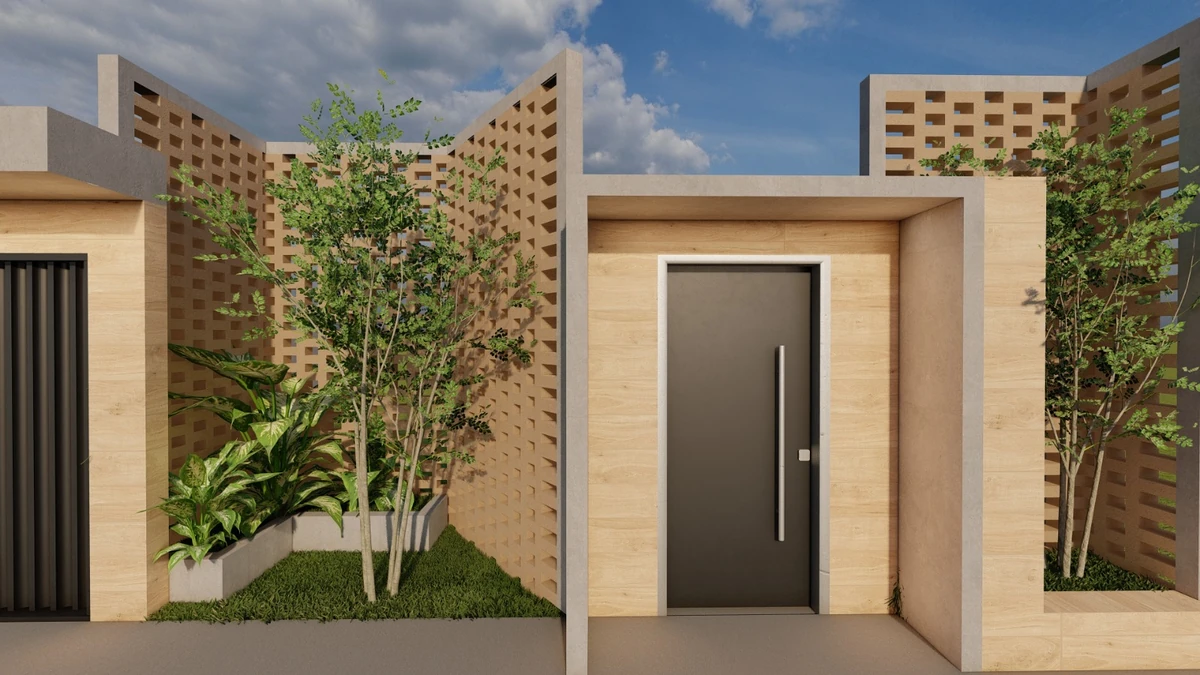 Detalhe do acesso social: porta emoldurada por porcelanato amadeirado e jardim lateral.