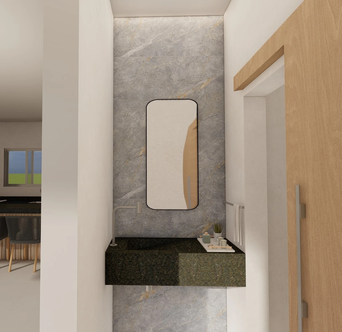 Lavabo visto a partir da sala de jantar, com bancada suspensa em granito verde.